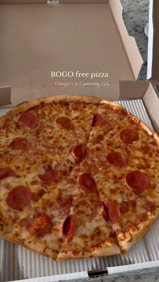 Giorgio’s Family Kitchen in Cumming showing pizza, bogo deal, video by Jenna Montgomery on Facebook