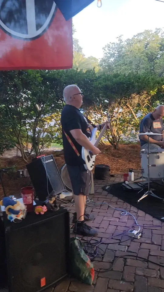 Gnat's Landing in St Simons Island showing live music, tacocat trio, video by Jennifer Koerner on Facebook