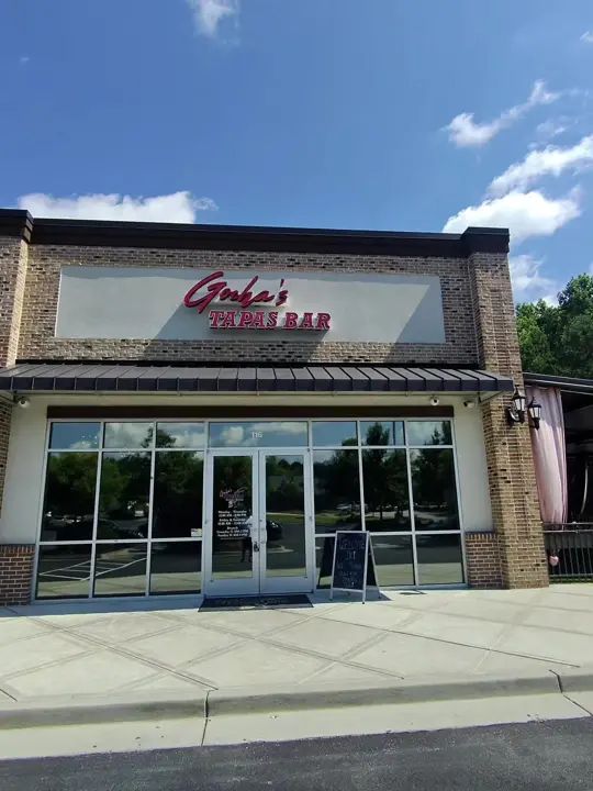 Gocha's Tapas Bar in Atlanta showing review, sophisticated ambiance, beautifully crafted cocktails, flavorful tapas, date night, celebrating with friends, video by pacotacoslifestyle on TikTok