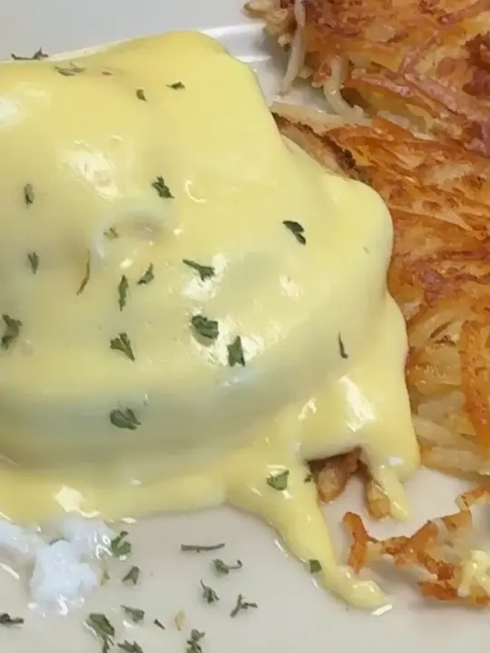 Golden Bear Restaurant in Largo showing breakfast, eggs benedict, hollandaise, hash browns, grits, video by goldenbearlargo8 on TikTok