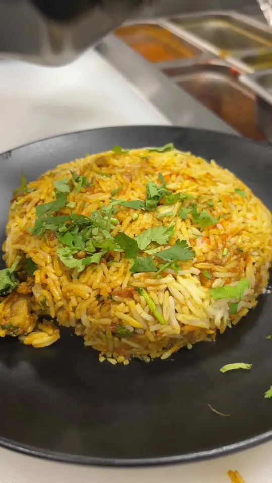  in Florida showing food, lamb biryani, raita, video by josiaheats on TikTok