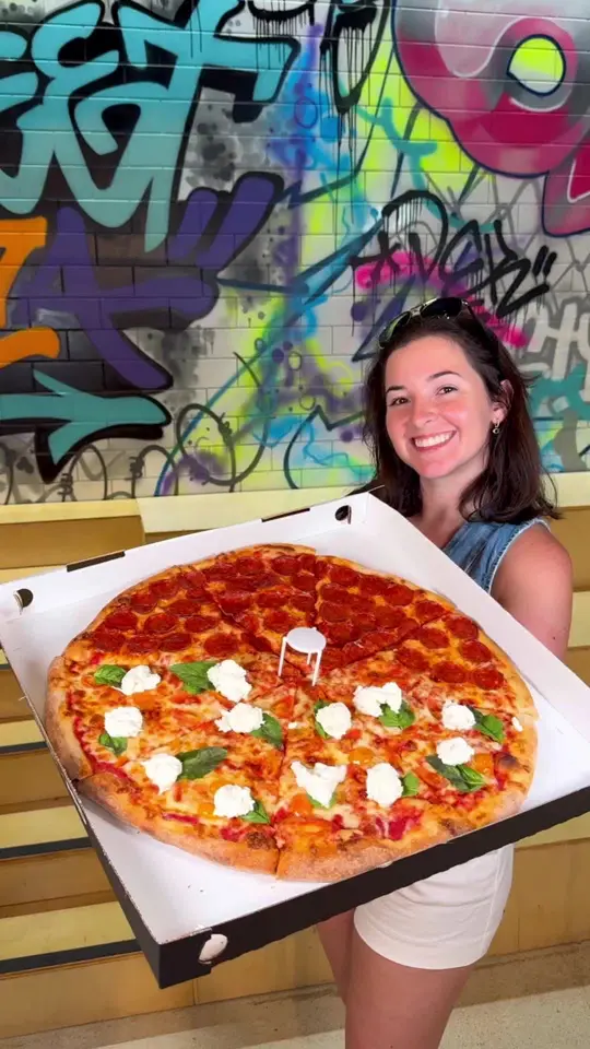 Golden Lizzard Pizza in Miami showing pizza, nystylepizza, pizzaslice, video by treatyoselfeverywhere on TikTok