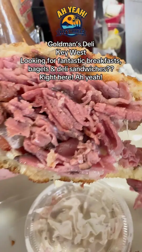 Goldman's Deli in Key West showing breakfast bagels, deli sandwiches, pancakes, early bird breakfast special, video by VFCs Travels on Facebook