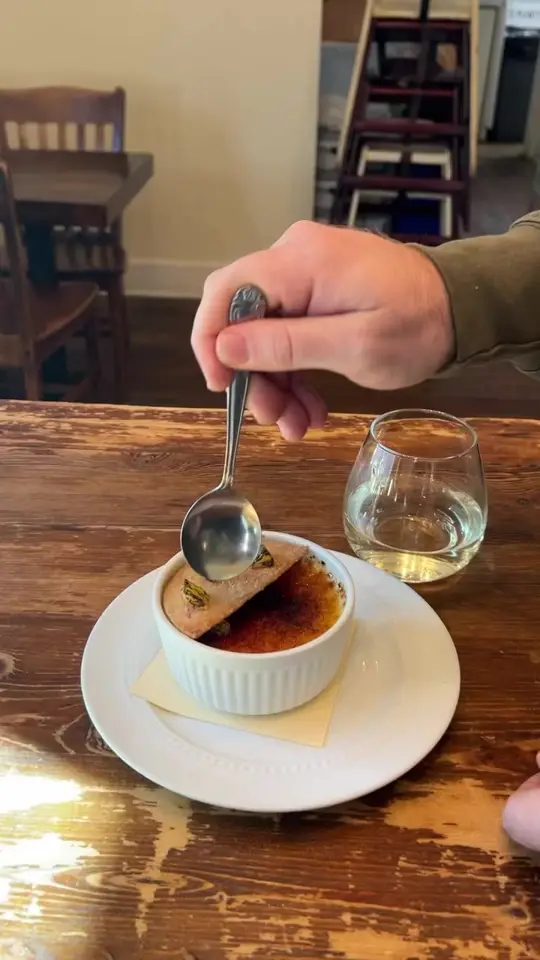 Gracious Plenty Bakery & Breakfast in Roswell showing event, gracious plenty @nite, food, crème brûlée with brûléed citrus and cranberry orange shortbread, video by Gracious Plenty Bakery & Breakfast on Facebook