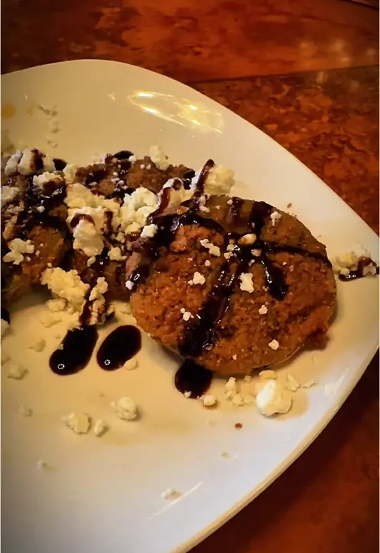 Green Door on Broad in Brooksville showing food review, shrimp, fried gouda, fried green tomatoes, crema pasta, pork tenderloin, video by rosshardy81 on TikTok