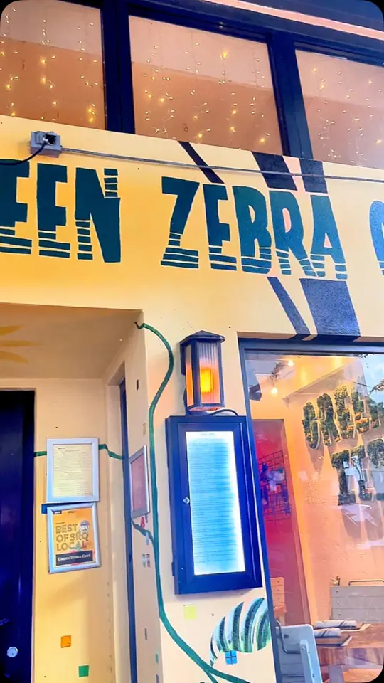 Green Zebra Cafe in Sarasota showing dessert, the egg, raw blueberry basil cheesecake, video by Nicholas Allman on Facebook