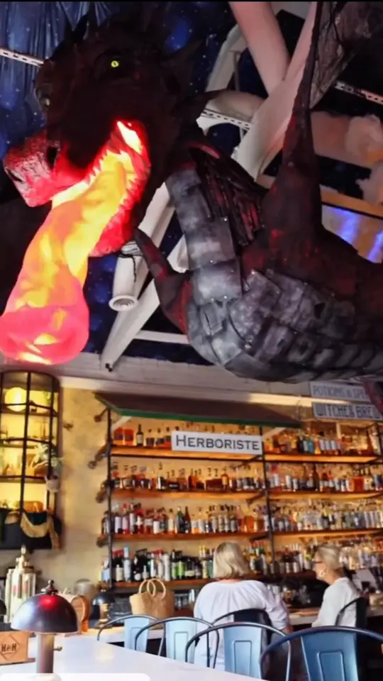 Hamp & Harry's in Marietta showing cocktail, magical cocktails, atmosphere, enchanted spaces, video by Marietta Square on Facebook