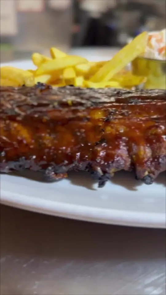Hard Rock Cafe in Atlanta showing food, baby back ribs, video by officialhardrockcafe on TikTok