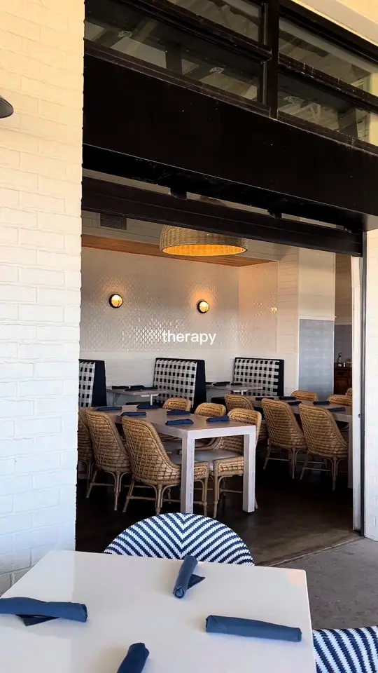 Harrison's Kitchen & Bar in Panama City showing waterfront cocktails, bayside dining, florida sunset drinks, video by Harrison's Kitchen & Bar on Facebook