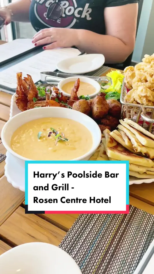 Harry's Pool Side Bar & Grill in Orlando showing restaurant, patio, swimming pool, gorgonzola dip, cuban cuisine, video by amazingdestinationsmag on TikTok