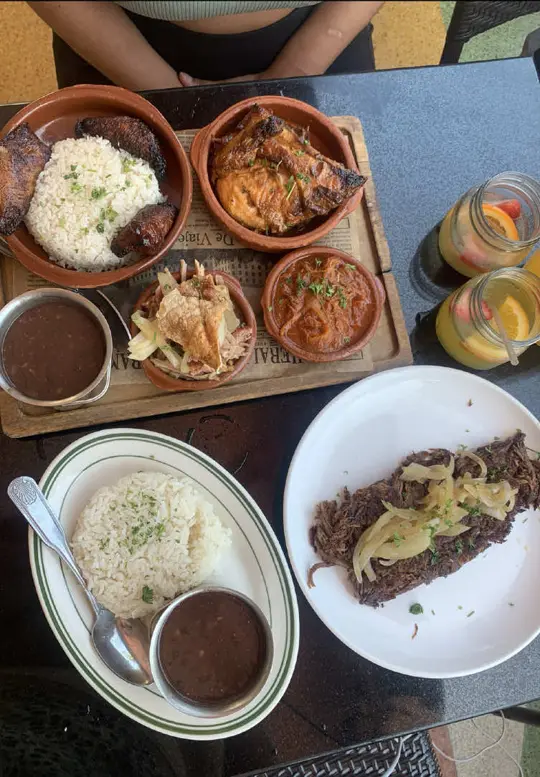 Havana 1957 in Miami Beach showing food, cuban sampler, rotisserie chicken, ropa vieja, lechon, white rice, black beans, sweet plantains, video by spicethefoodie on TikTok