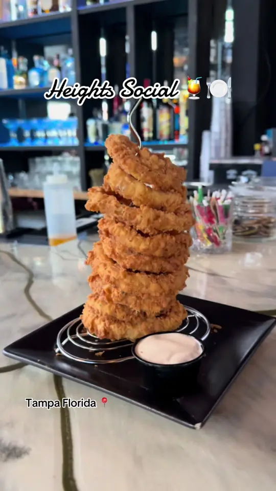 Heights Social in Tampa showing burger, cocktail, video by heightssocial on TikTok