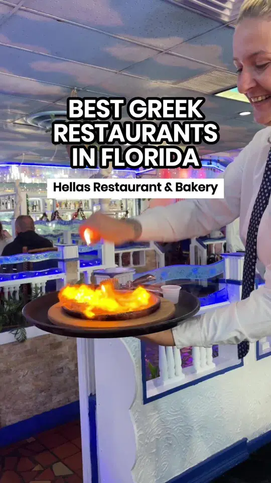 Hellas Restaurant & Bakery in Tarpon Springs showing restaurant visit, saganaki, gyro, spanakopita, video by ilovetheburgstpete on TikTok