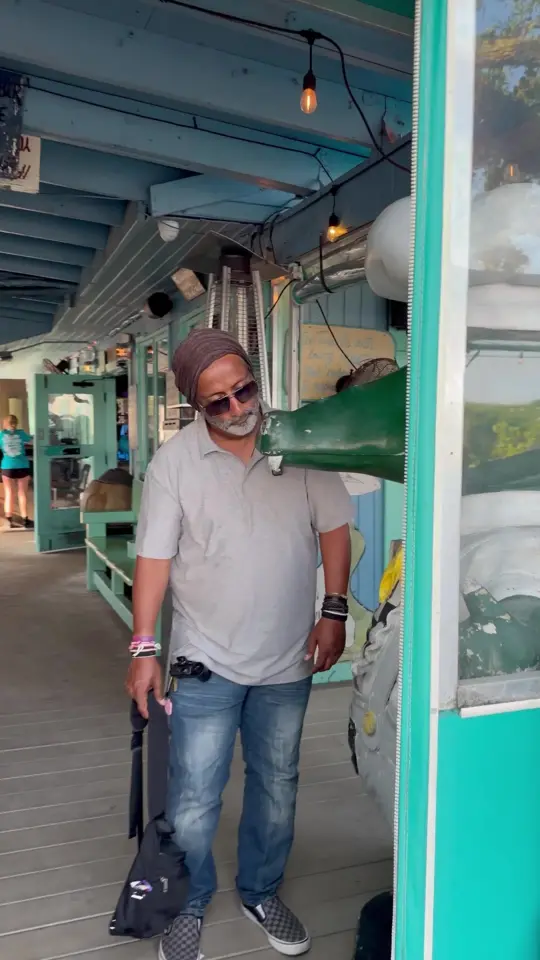 Hidden Treasure Rum Bar & Grill in Ponce Inlet showing review, visit, cocktail, fried green tomatoes, video by thedishwithtrishh on TikTok