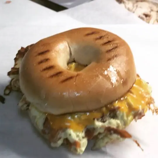 Highland Deli & Grill in Carrollton showing food, bacon, egg, and cheese bagel, video by The Highland Deli and Grill on Facebook