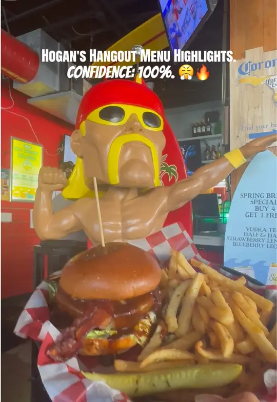 Hogan's Hangout in Clearwater showing review, big fish sandwich, heavyweig burger, video by clearwaterbeachinsider on TikTok