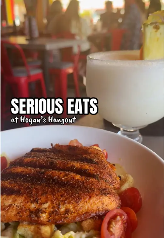 Hogan's Hangout in Clearwater showing drink, giant bucket drinks, food, seared scallops, blackened fish, calamari, sliders, video by clearwaterbeachinsider on TikTok