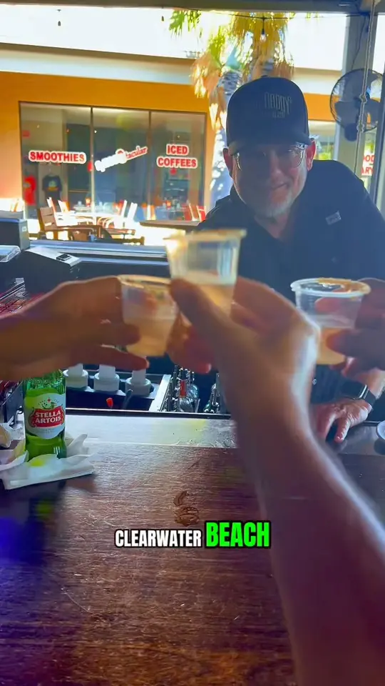 Hogg Daddy's Beach Bar & Grill in Clearwater Beach showing review, visit, drinks, food, video by Clearwater Beach is Awesome on Facebook