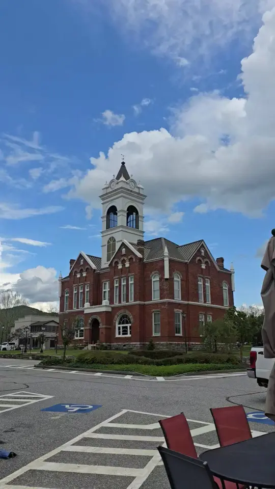 Hole In The Wall in Blairsville showing atmosphere, patio, live music, courthouse bells, video by The Hole In The Wall Ga on Facebook