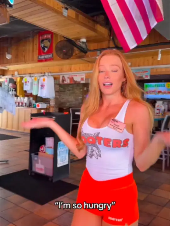 Hooters in Spring Hill showing burger, video by hooters on TikTok