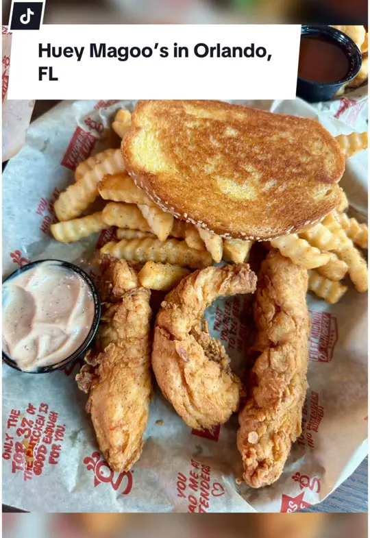 Huey Magoo's Chicken Tenders - St. Augustine in St. Augustine showing food review, chicken tenders, hot honey dip, candy corn lemonade, video by christinainitalia on TikTok
