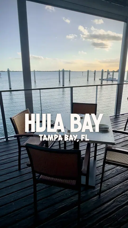 Hula Bay Club in Tampa showing restaurant, waterfront views, island vibes, seafood, burgers, wings, tropical cocktails, video by thingstodo.florida on TikTok