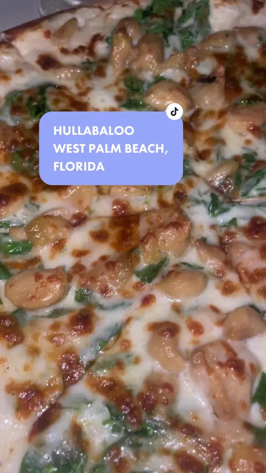 Hullabaloo in West Palm Beach showing appetizers, cocktails, garlic spinach pizza, video by taylors_tayble on TikTok