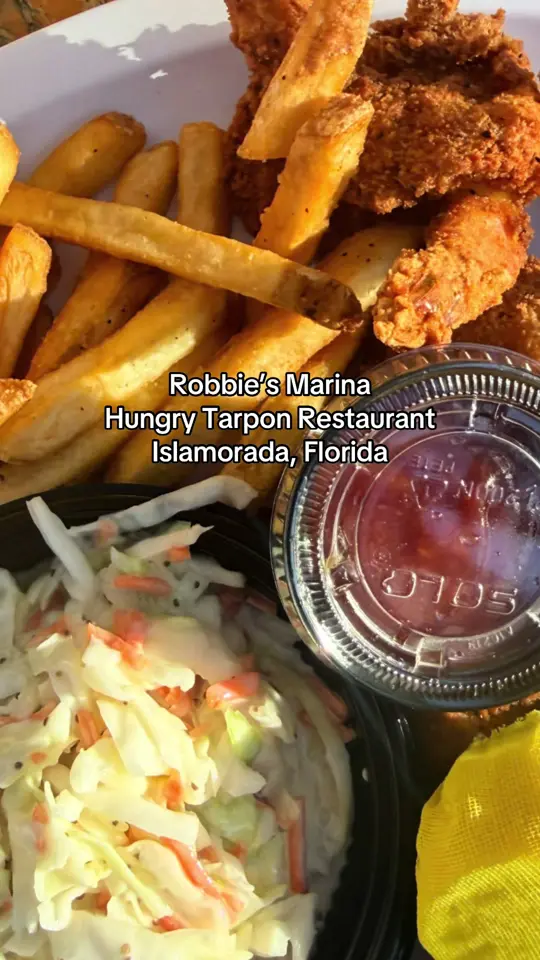 Hungry Tarpon Restaurant in Islamorada showing food, fried shrimp with coleslaw & fries, video by cookingwtiffany on TikTok