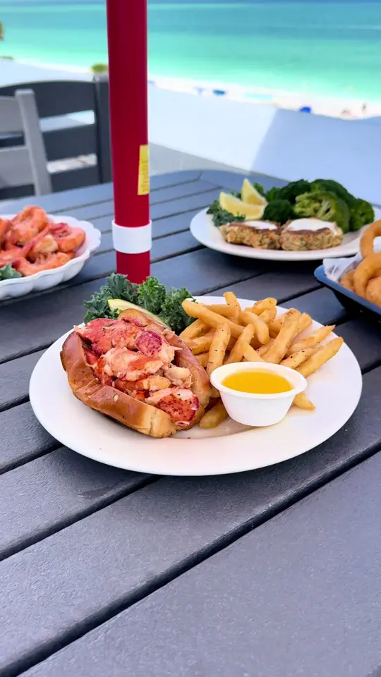 Hurricane Seafood Restaurant in St. Pete Beach showing review, lobster roll, video by eatlocalflorida on TikTok