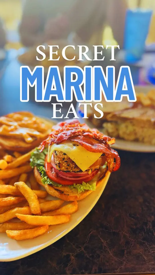 Ichabod's Dockside Bar & Grille in Melbourne showing review, crispy mahi reubens, fresh ahi tuna sandwiches, marina views, happy hour, video by spacecoastvibeanddine on TikTok