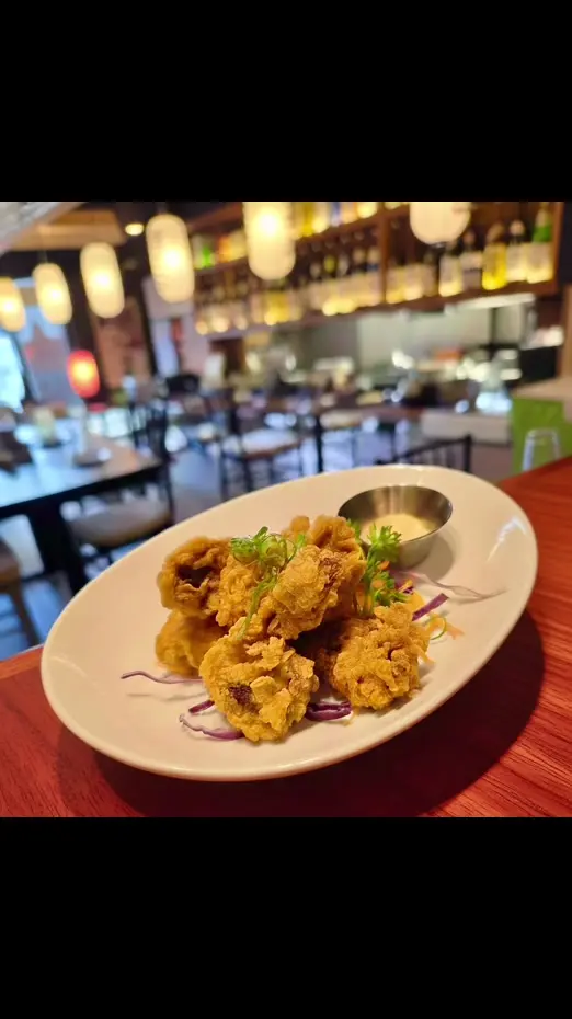 Ichiban Izakaya Restaurant in St. Petersburg showing food, crispy chicken gizzards, creamy wasabi avocado mayo, video by ichibanizakayastpete on TikTok