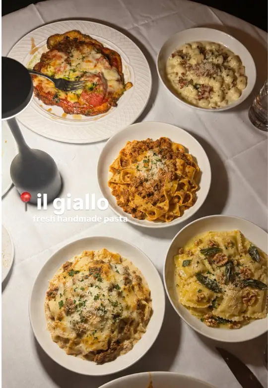 il Giallo Osteria & Bar in Sandy Springs showing food, garlic focaccia bread, caesar salad, meatballs, gnocchi di parade, pappardelle, lasagna, garganelli, chicken parm, video by ambermillice on TikTok