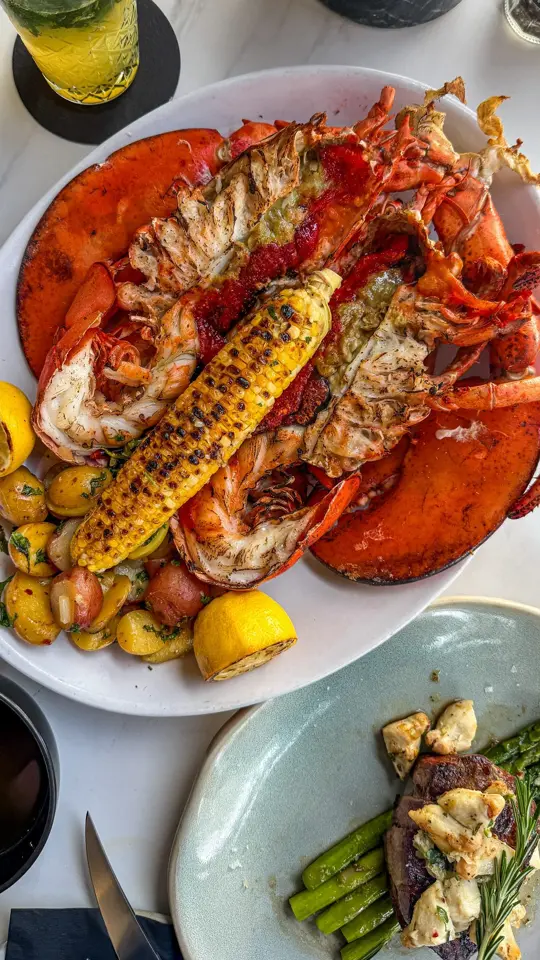 Jackson's Bistro Bar And Sushi in Tampa showing review, coconut shrimp, volcano roll, lobster, drawn butter, filet, peanut butter torte, banana cheesecake, video by Noelle Lennon on Facebook