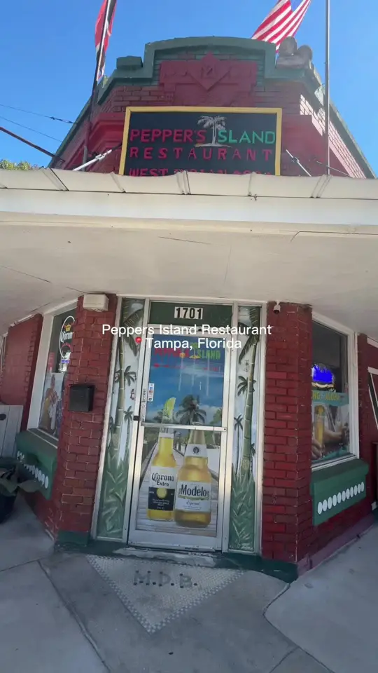Jamaica Jamaica Island Cuisine in Tampa showing review, authentic flavor, vibes, video by iamchkra on TikTok