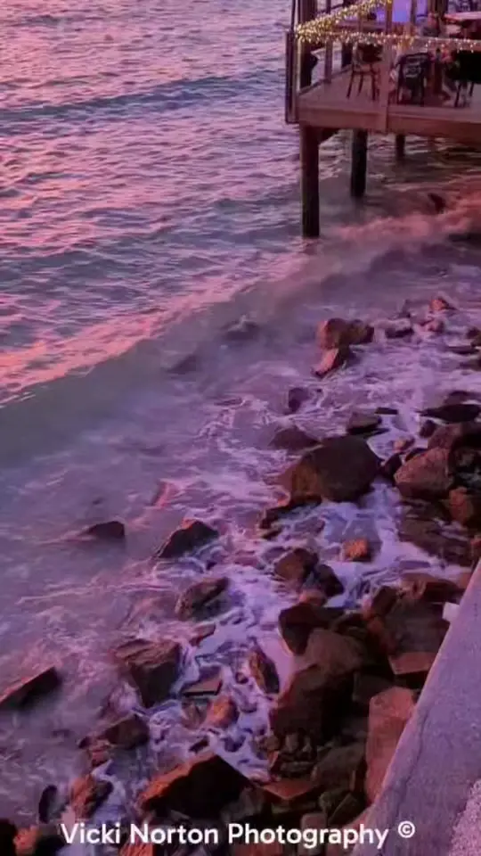 Jimmy's Fish House & Iguana Bar in Clearwater showing atmosphere, sunset, video by Vicki Norton Photography on Facebook