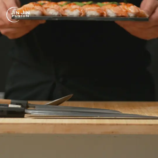 Jin Jin Fusion in Panama City Beach showing sushi, sashimi, nigiri, specialty rolls, a la carte menu, video by Jin Jin Fusion on Facebook