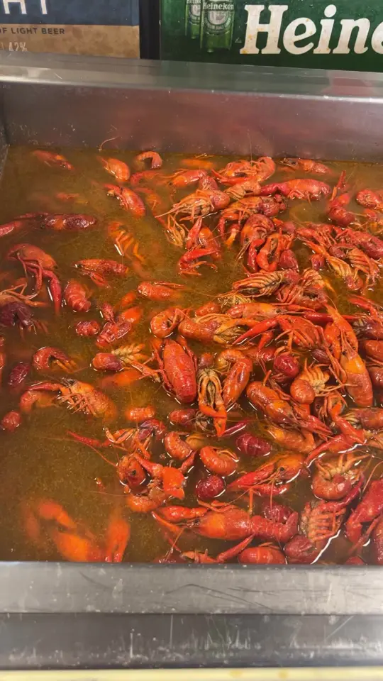 John Seafood in Pensacola showing food, hot and spicy crawfish, video by Pensacola  john seafood on Facebook