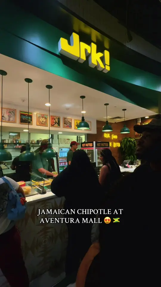 Jrk! in Aventura showing rice and peas, curry chicken, cabbage, corn, yuca sticks, video by krystalaleya on TikTok