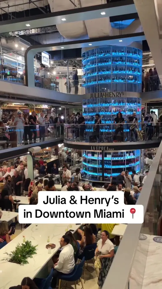 Julia & Henry's Food Hall in Miami showing food hall, 26 vendors, bars, wine tower, beer market, bakery, rooftop area, sound room, music entertainment, video by livinmiami305 on TikTok