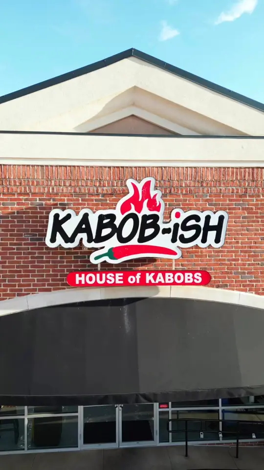 Kabob-ish in Decatur showing food, spicy chicken koobideh, chicken tikka, lamb chops, chicken shawarma wrap, salmon, video by Kabob-ish on Facebook