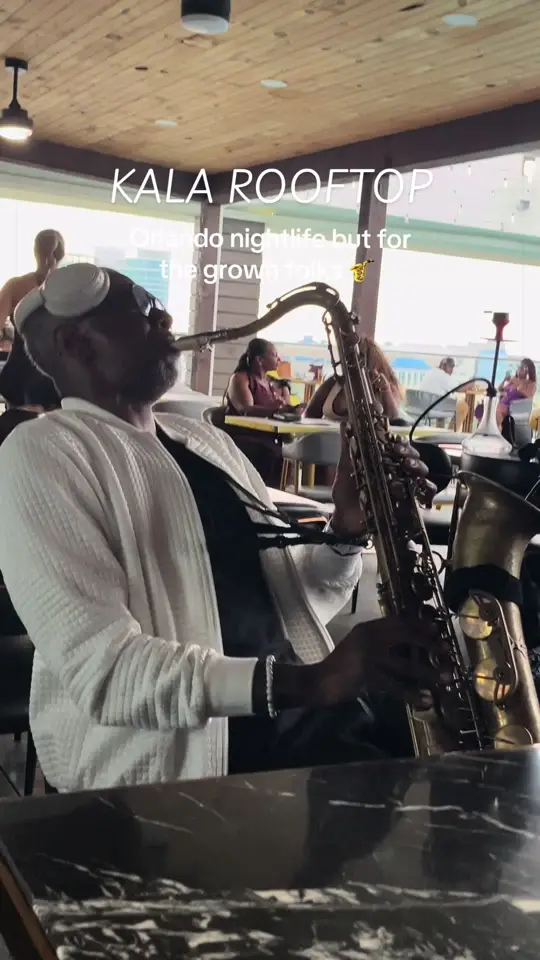 KaLa Rooftop Restaurant in Orlando showing live music, saxophonist, dj, rooftop ambiance, date night, video by callmelolab on TikTok