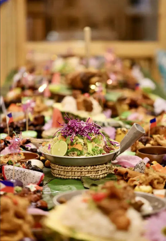 Kamayan ATL - Filipino Restaurant in Doraville showing food, lechon sisig, lumpia, eggplant coconut curry, crispy pata, ube flan cake, video by eat.tray.love on TikTok