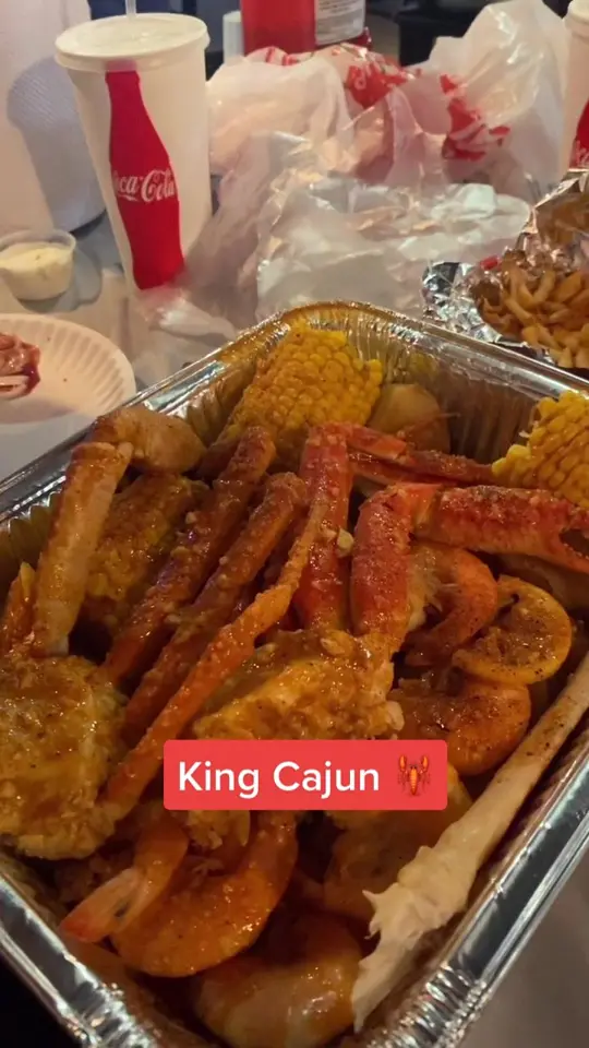 King Cajun Crawfish in Orlando showing seafood boil, crawfish, wings, video by tagalongwithuss on TikTok