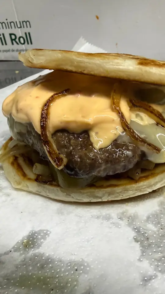 King's Grill in Hollywood showing food, paratha burger, video by King's Grill on Facebook