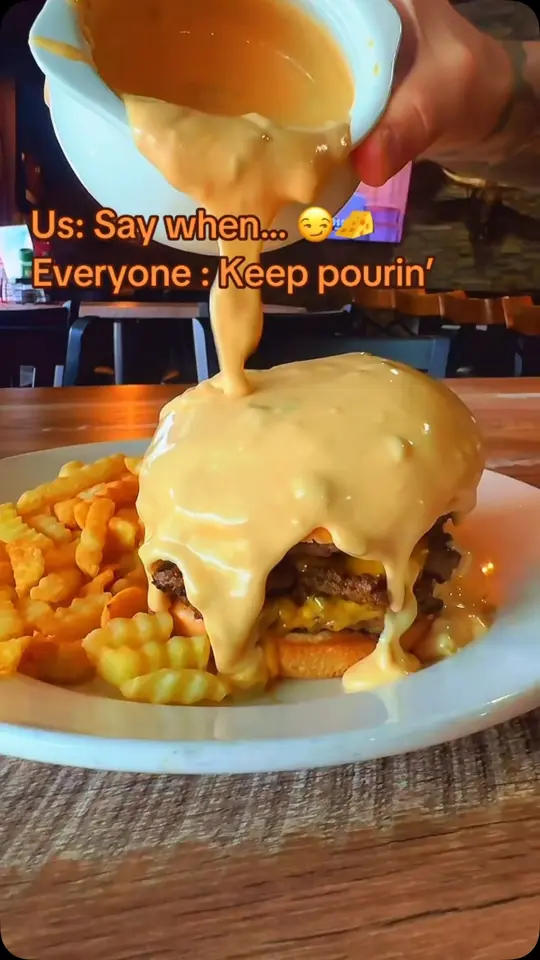 Kings Roadhouse Bar & Grill in Port Charlotte showing food, hot mess burger, queso sauce, video by Kings Roadhouse on Facebook