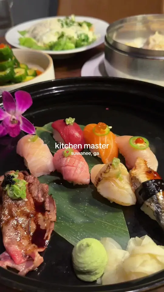Kitchen Master in Suwanee showing seaweed avocado salad, cucumber salad, berkshire pork soup dumplings, chili wonton noodles, pork belly guabao, nigiri tasting set, video by patriciasuckss on TikTok