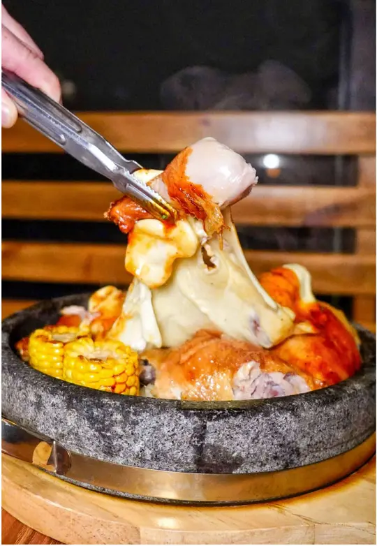 Koquio in Duluth showing food, crispy rice rotisserie chicken, gochujang mozzarella topping, ube ice cream, video by eat.tray.love on TikTok