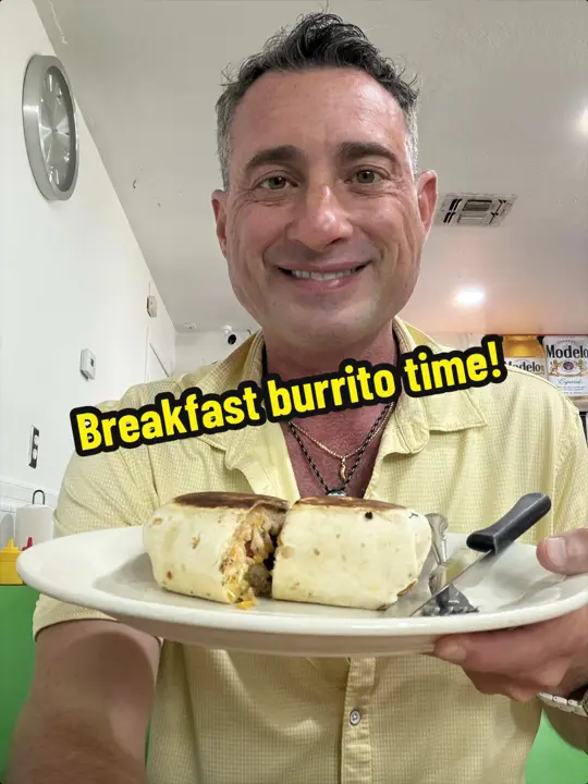 La Fiesta NSB in New Smyrna Beach showing food, breakfast burrito, video by foodiejustice on TikTok