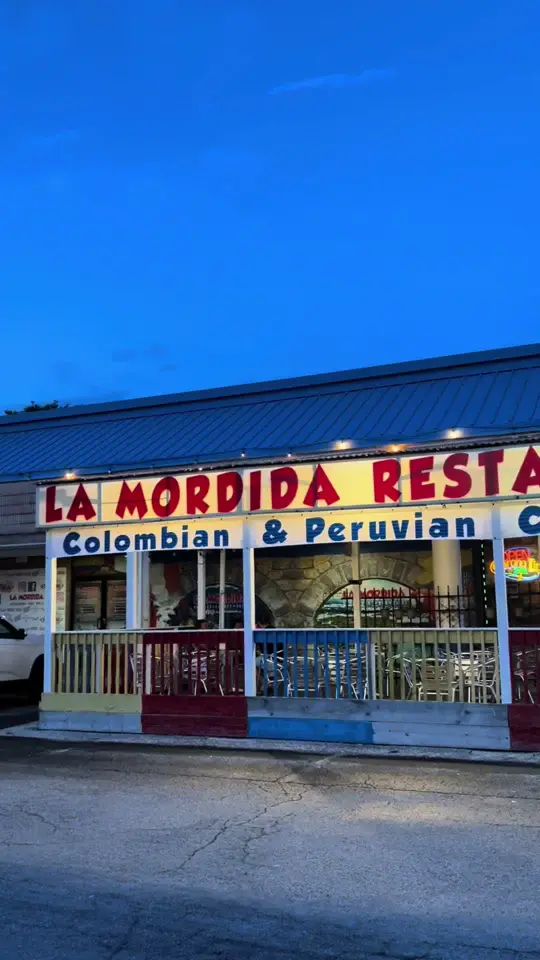 La Mordida Restaurant Bar & Grill in Clearwater showing restaurant visit, yuca fries, chicken tostones, video by ohh.odalisss on TikTok