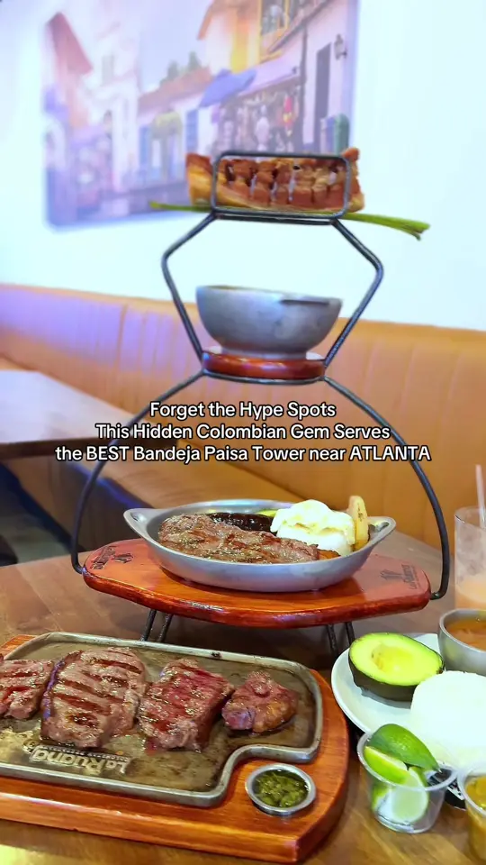 La Ruana Colombian Restaurant in Peachtree Corners showing food, bandeja paisa tower, steak, video by lemaitravel on TikTok